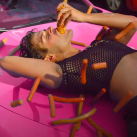WATCH: Garrett Clayton gets down with the ‘Barbie Boys’ in wiener-filled music video