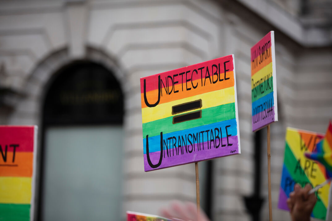 A rainbow sign that says "Undetectable = Untransmittable."