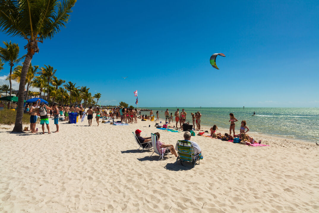 A crowd leisuring at the beach in Key West. 