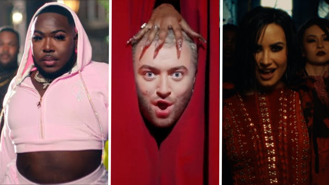 Three panel image: on the far left, Saucy Santana purse his lips while wearing a pink crop top hoodie. In the middle, Sam Smith's head pops out of a red curtain while a nailed hand caresses it in the "Unholy" video. On the far right, Demi Lovato walks through a dark hallway wearing a red Medieval outfit.