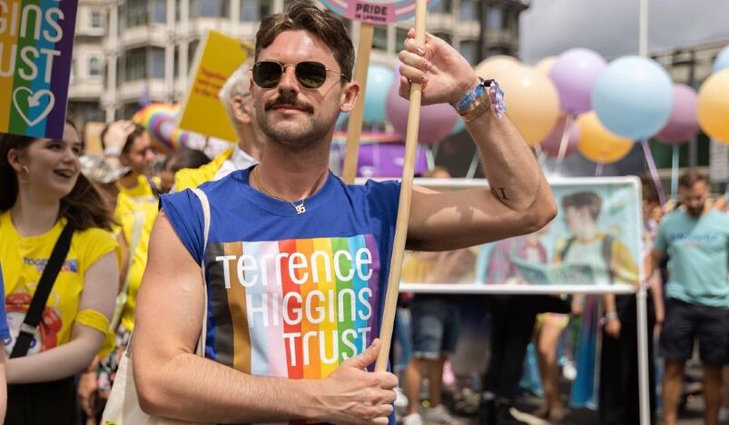 Dan marches at Pride with the Terrence Higgins Trust 