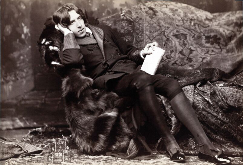 The poster boy of Victorian era gay porn: Oscar Wilde, (1854-1900) Irish literary genuis, in flamboyant costume. 1882 studio portait by Napoleon Sarony.