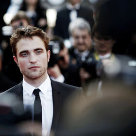 Robert Pattinson admits to “pleasuring himself” on set
