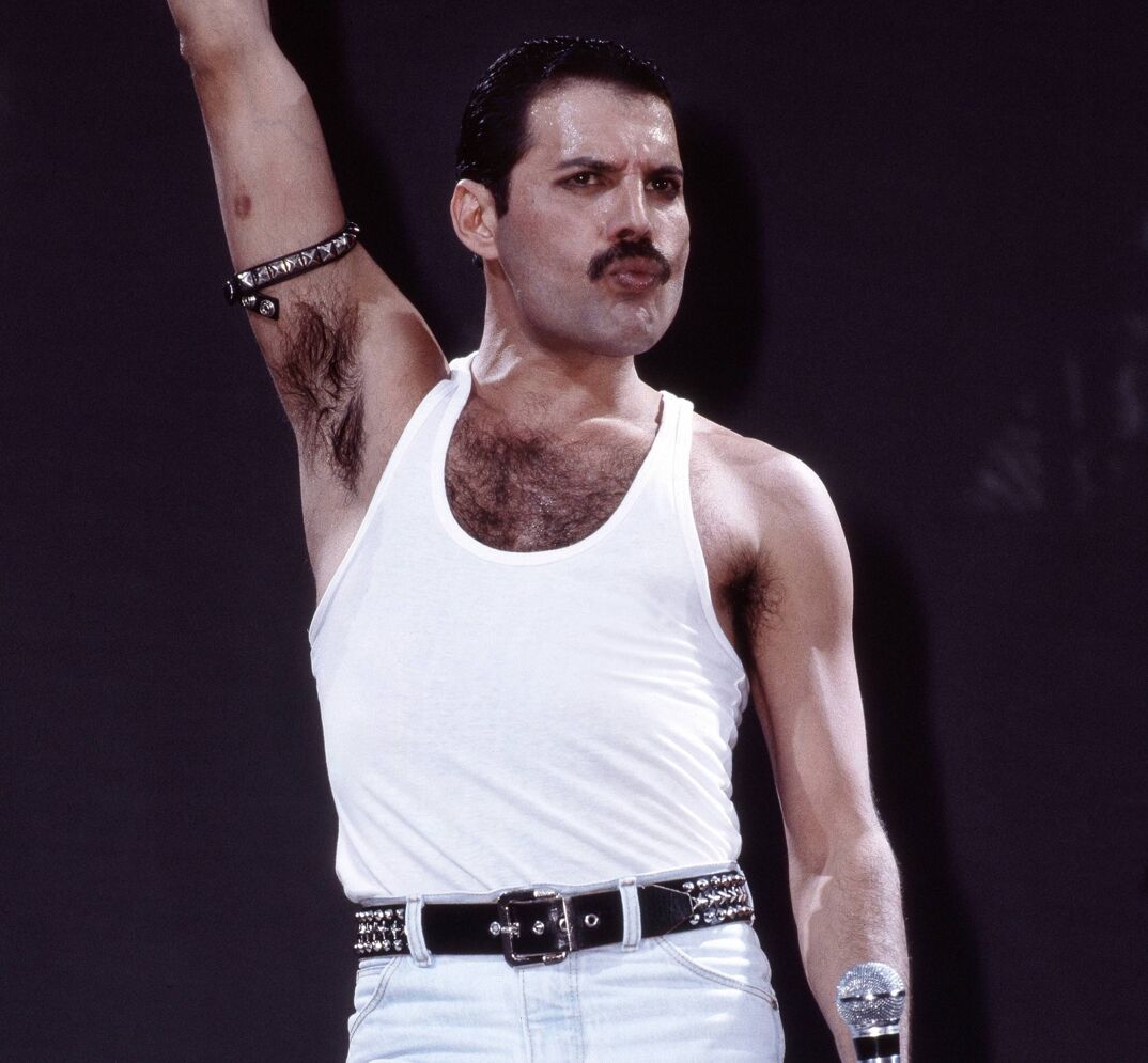 Freddie Mercury in his iconic white tank top at Live Aid