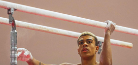 Star gymnast Sam Phillips is a team captain & attributes his success to coming out as bisexual