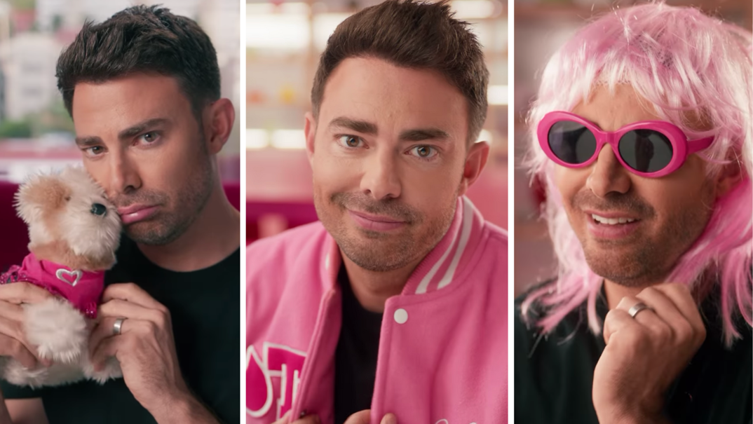Three panel image. On the left, Jonathan Bennett pouts while holding a stuffed puppy wearing a pink bandana. In the middle, he smirks while wearing a pink varsity jacket. On the far right, he giggles while wearing a pink shaggy wig, pink sunglasses and a wedding ring.