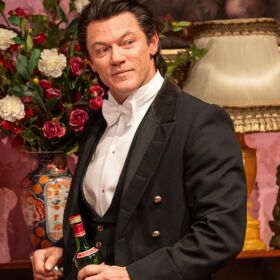 Luke Evans enjoys a royal romp as a gay footman in this world premiere play