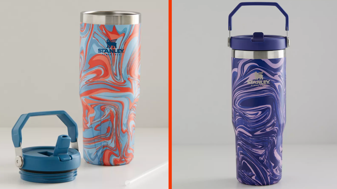 Two-panel image. On the left, a water bottle covered in blue and orange swirls stands against a gray background. The bottle reads "Stanley" and its blue lid with straw sits next to it. On the right, the same cup is pictured with a purple lid and a dark and light purple swirl. 
