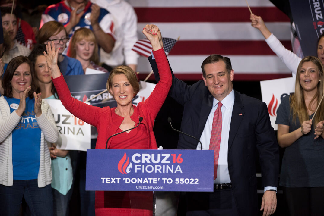 Carly Fiorina and Ted Cruz standing at a podium in 2016.