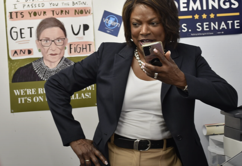Val Demings talking into a cellphone