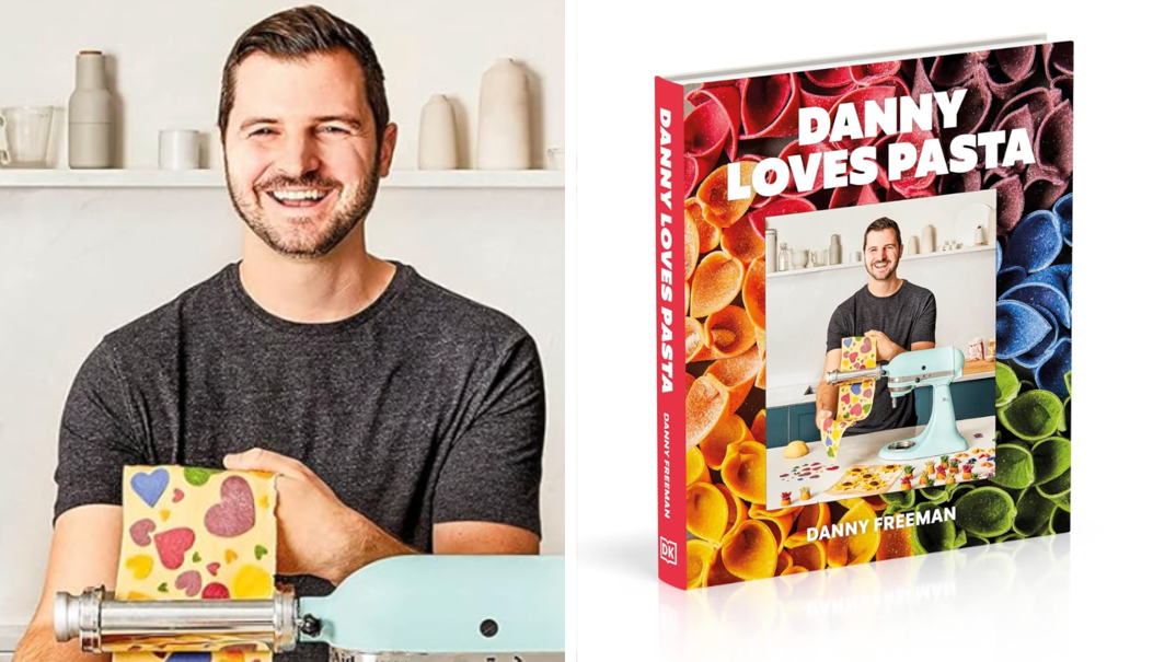 Two-panel image. On the left, Danny Freeman stands in front of a white kitchen background in a gray crewneck t-shirt. He pulls a sheet of yellow pasta, with colorful hearts engrained in it, from a pasta-maker. On the right, the same image appears on his book "Danny Loves Pasta", which features rainbow colored shell noodles underneath the image.