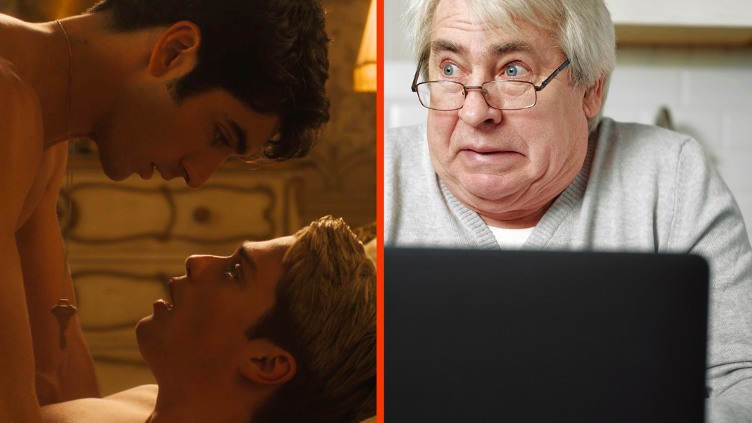 Two-panel image. On the far left, Taylor Zakhar Perez lays on top of Nicholas Galitzine with a key necklace hanging from his neck. Both men are shirtless laying in bed in a scene from 'Red, White, and Royal Blue.' On the right, an older man with white hair and glasses looks off embarrassed. He wears a gray V-neck sweater and sits at a kitchen table in front of a black computer screen.