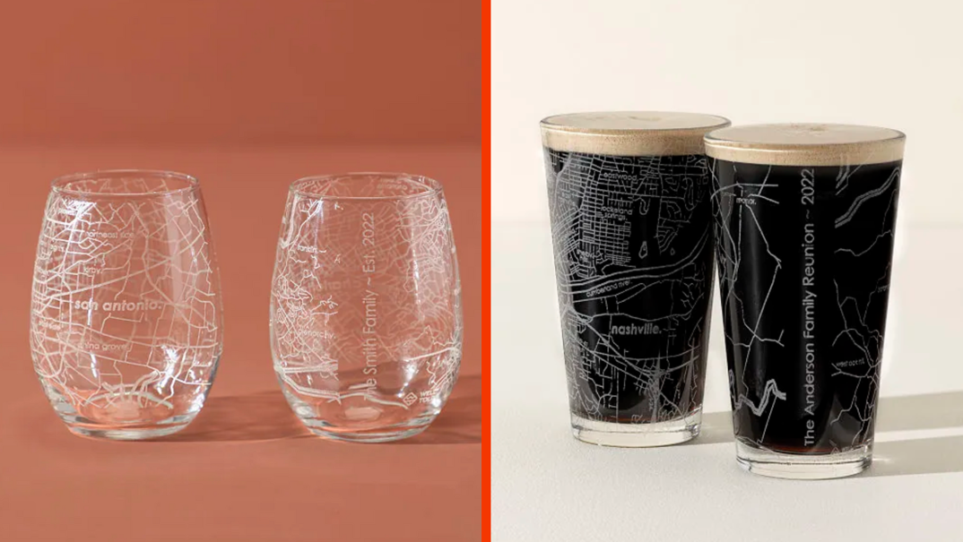 Two-panel image. On the left, two transparent wine glasses sit in front of a peach colored backdrop. They have maps of San Antonio etched, reading the city's name. On the right, two transparent pint glasses sit filled with a dark brown liquid. They feature a map of Nashville etched, reading the city's name. They're pictured in front of an off-white background.