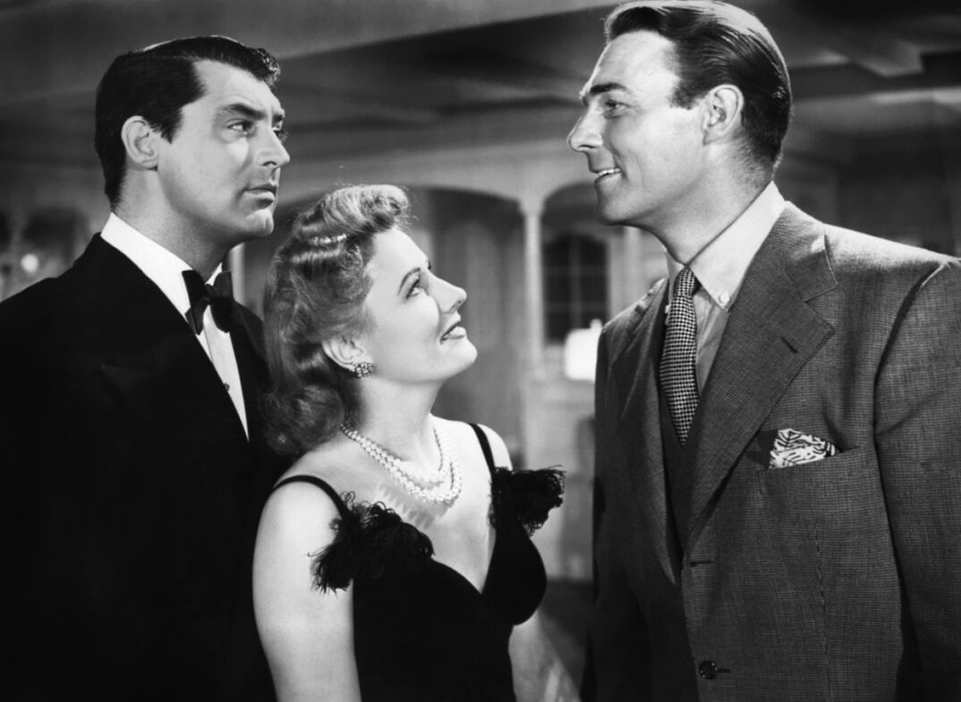 Actress Irene Dunne, Cary Grant and Randolph Scott in a scene from the movie "My Favorite Wife" (Photo by Donaldson Collection/Getty Images)