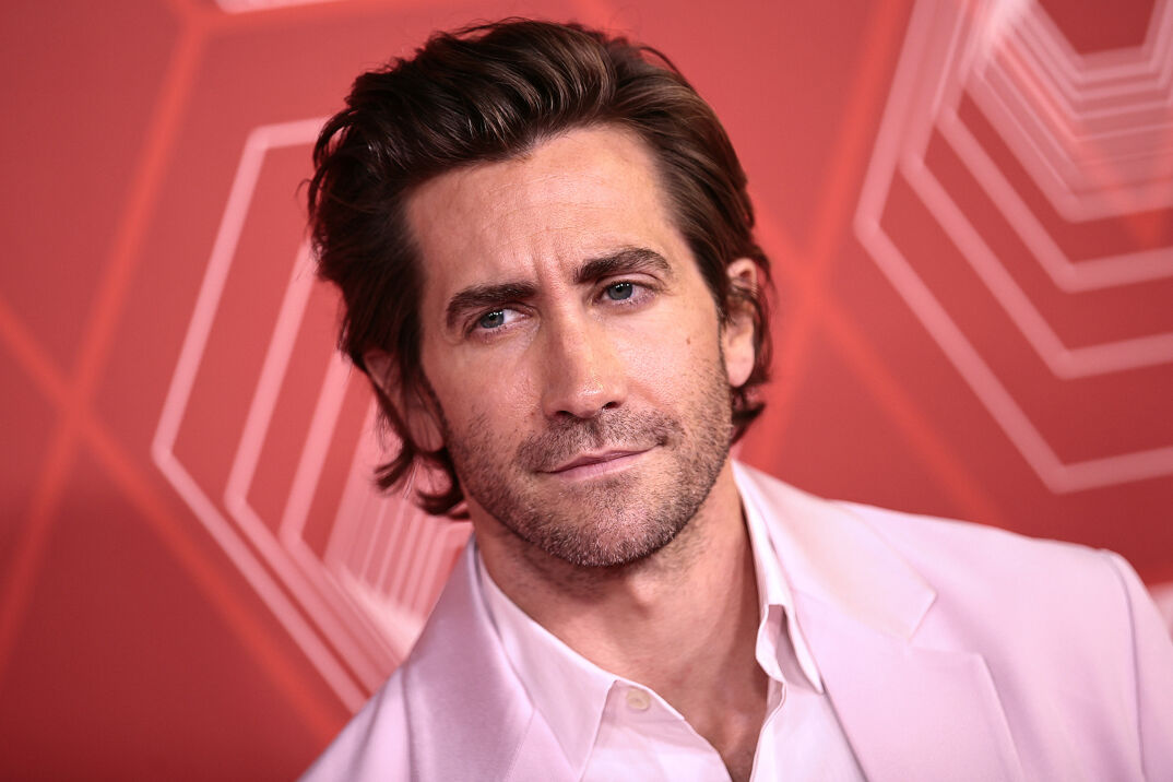 Jake Gyllenhaal in a pink suit