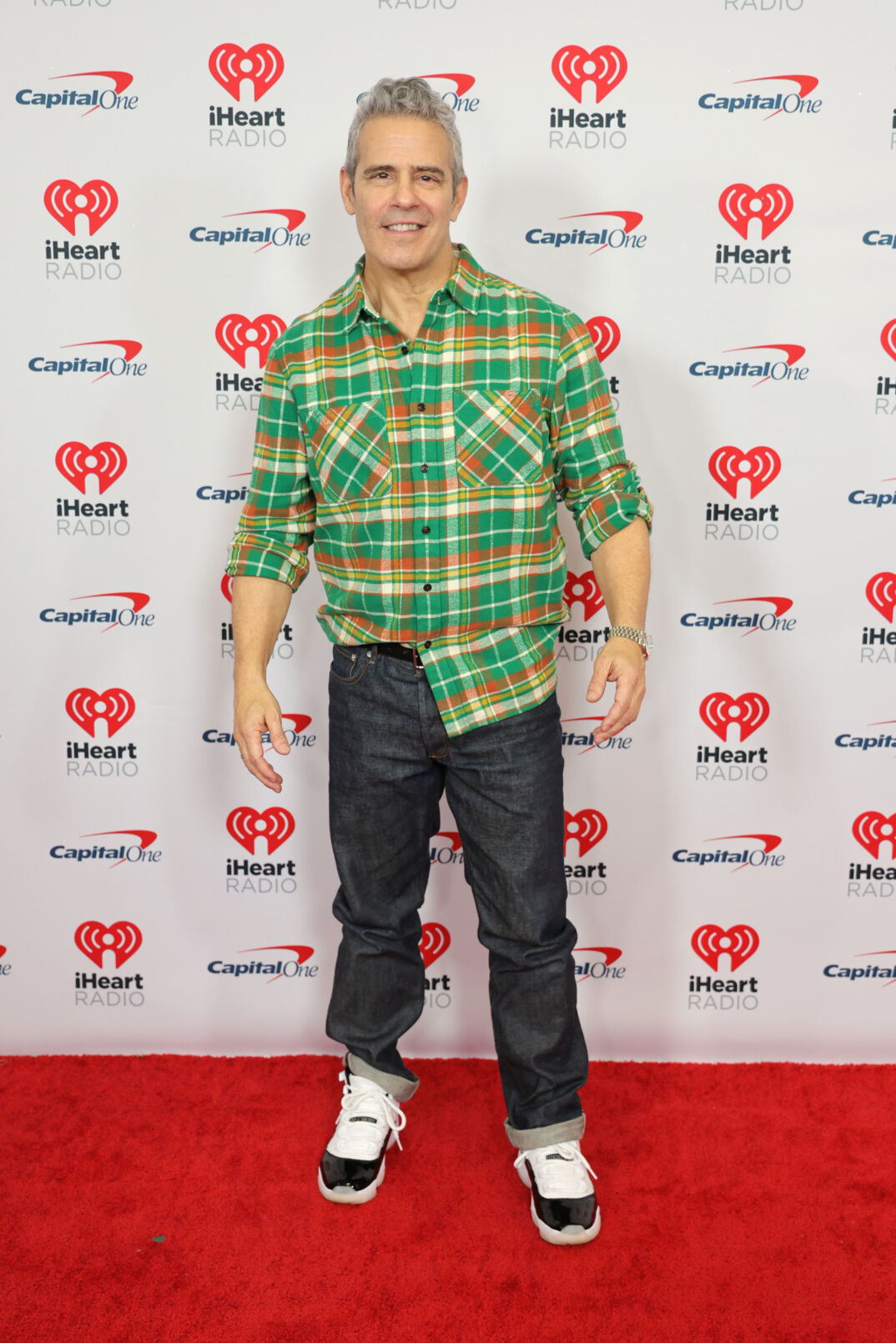 Andy Cohen in a flannel and jeans