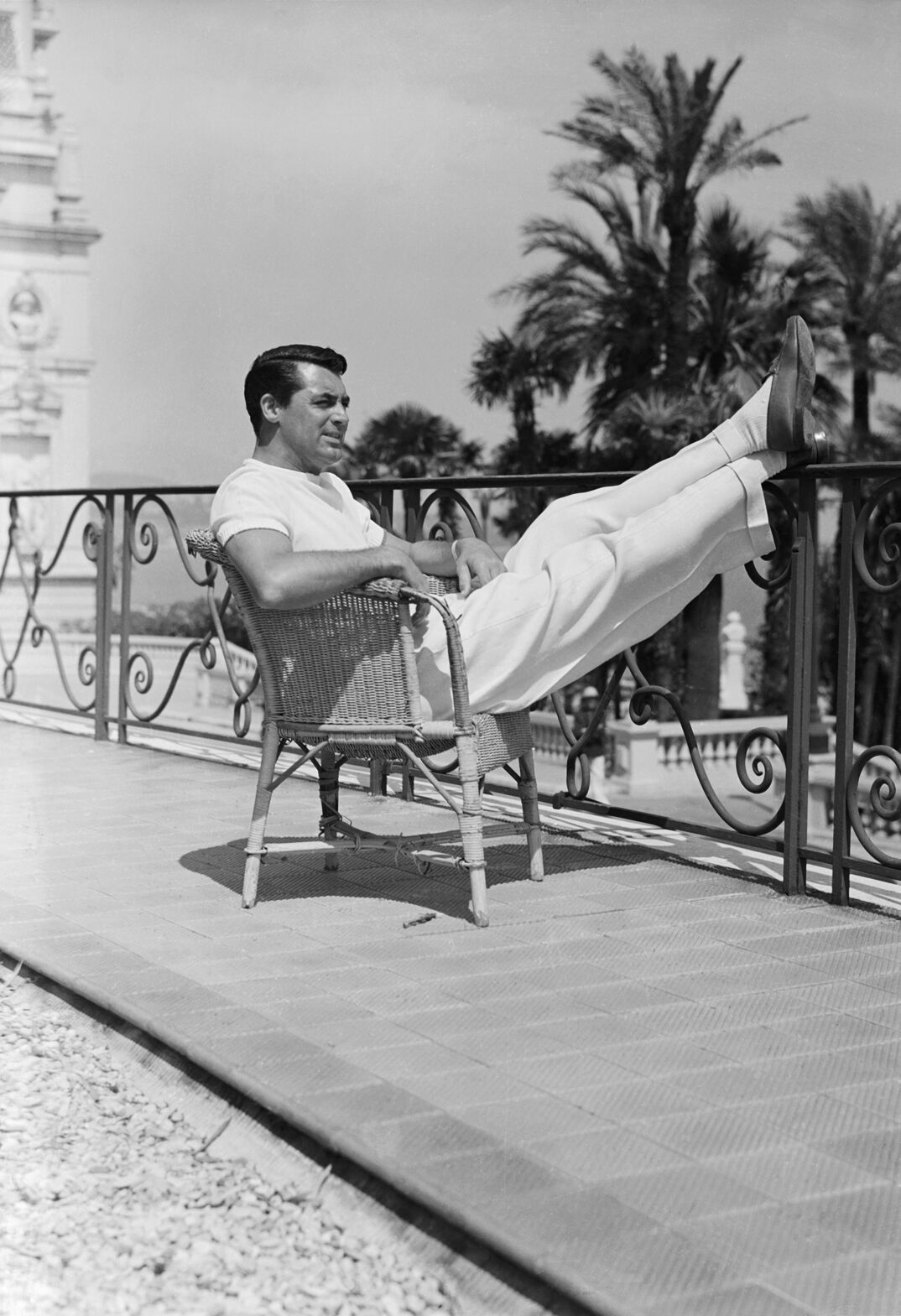(Original Caption) Cary Grant, film idol, is snapped as he recently appeared in the gardens of the Hotel de Paris where he stopped on his vacation tour which will carry him to Italy. He expects to return for a sojourn at the famous gambling resort.