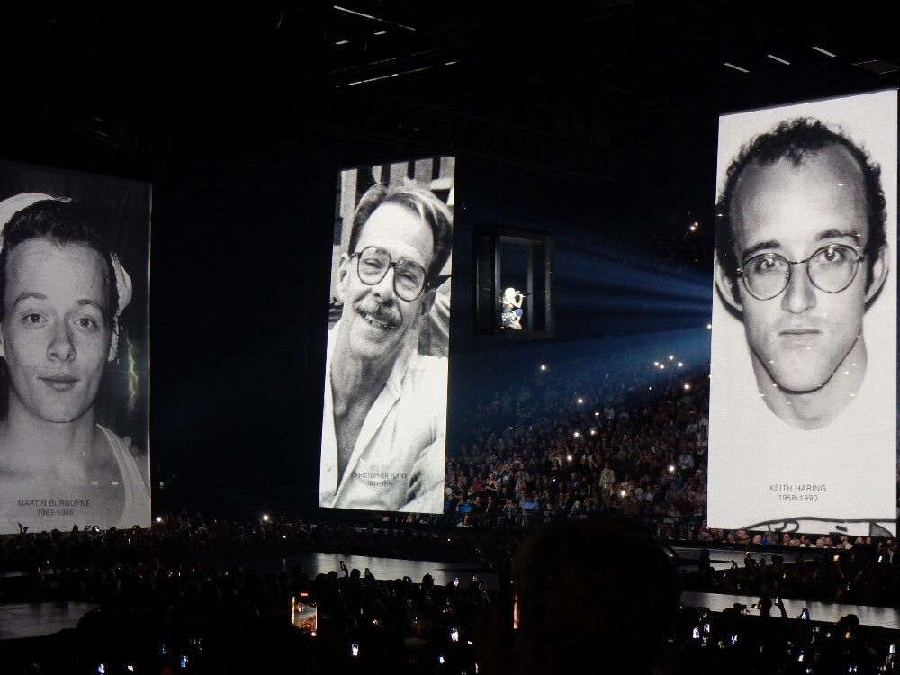 L-R: Martin Burgoyne, Christopher Flynn and Keith Haring images during Madonna's Celebration show