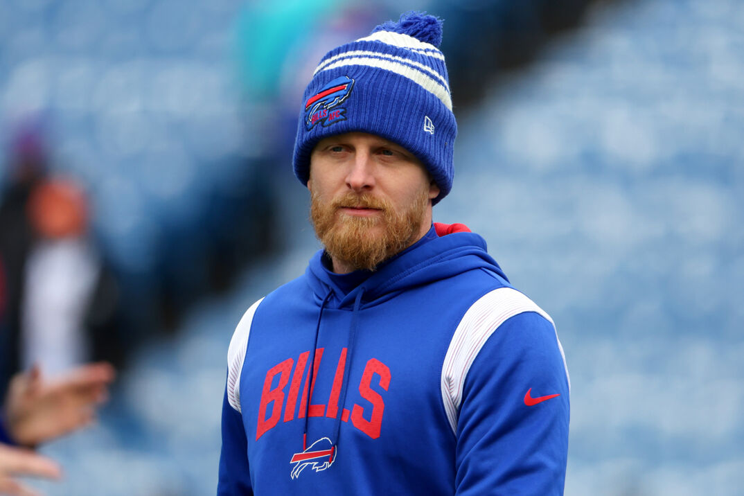 Cole Beasley wearing a Buffalo Bills winter hat and sweatshirt. 