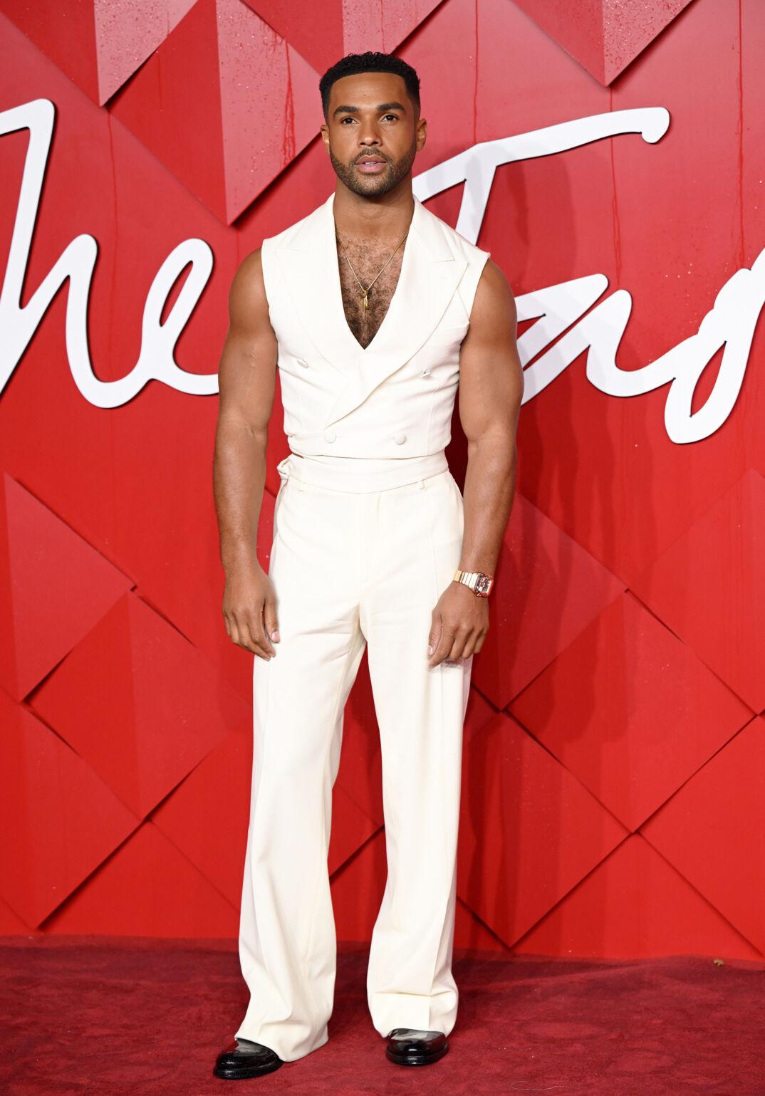  Lucien Laviscount in white sleeveless top