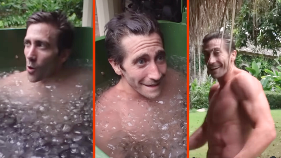 Three-panel image of a shirtless and muscular Jake Gyllenhaal with short brunette hair. In the left and middle panels, he sits submerged up to his neck in a green ice bath outdoors. He smiles and winces at the temperature. In the right panel, he walks under palm trees and smiles, dripping wet after just leaving the bath.
