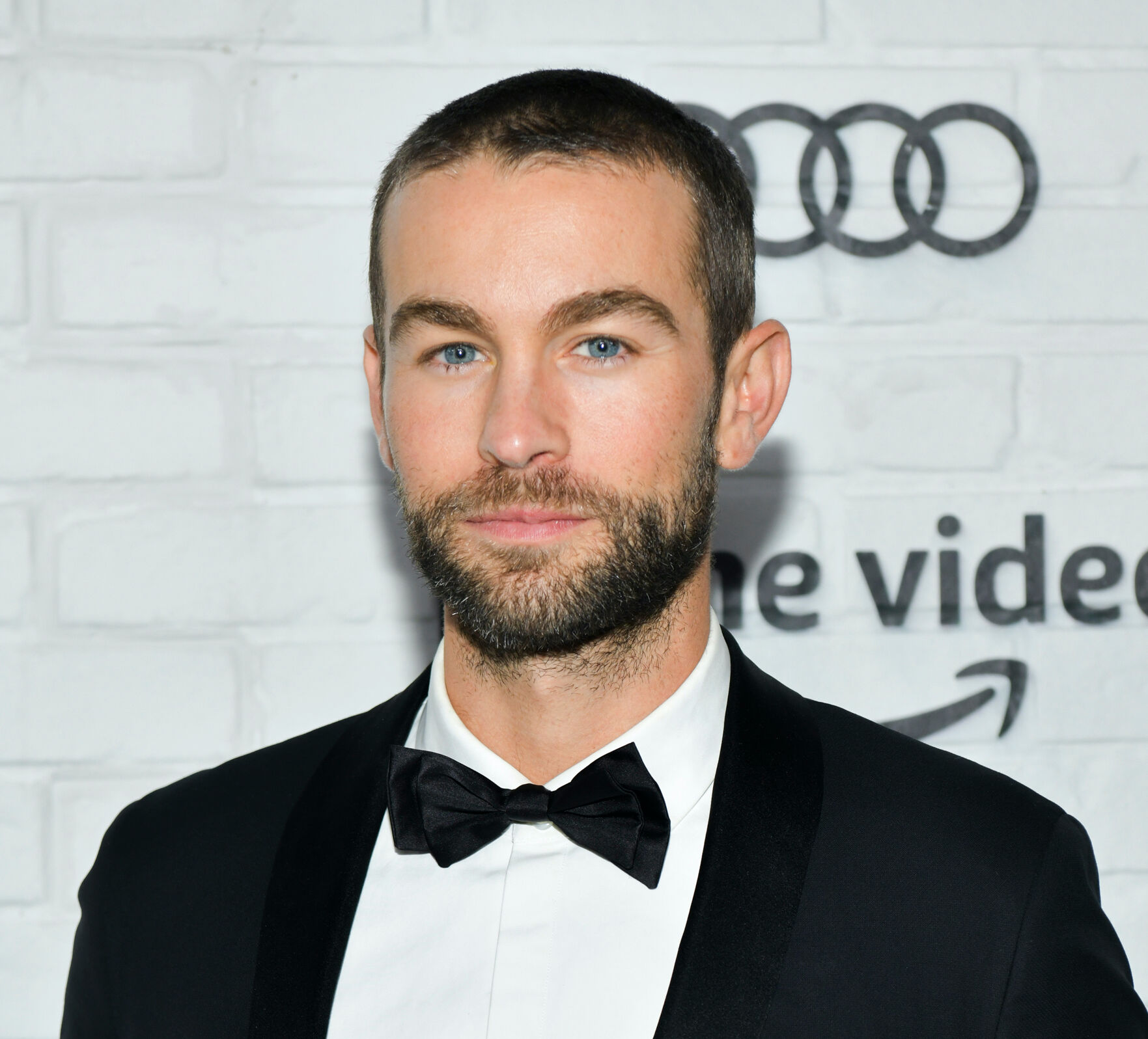 Chace Crawford shows off his hairy pits and abs in grey sweatpants