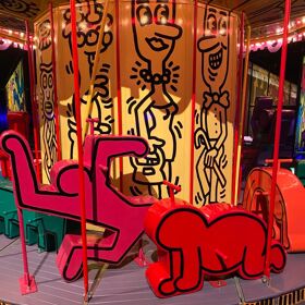 New “amusement park” puts Keith Haring & David Hockney on a merry-go-round