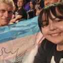 WWE star Cody Rhodes holds up transgender flag to show that wrestling is for everyone