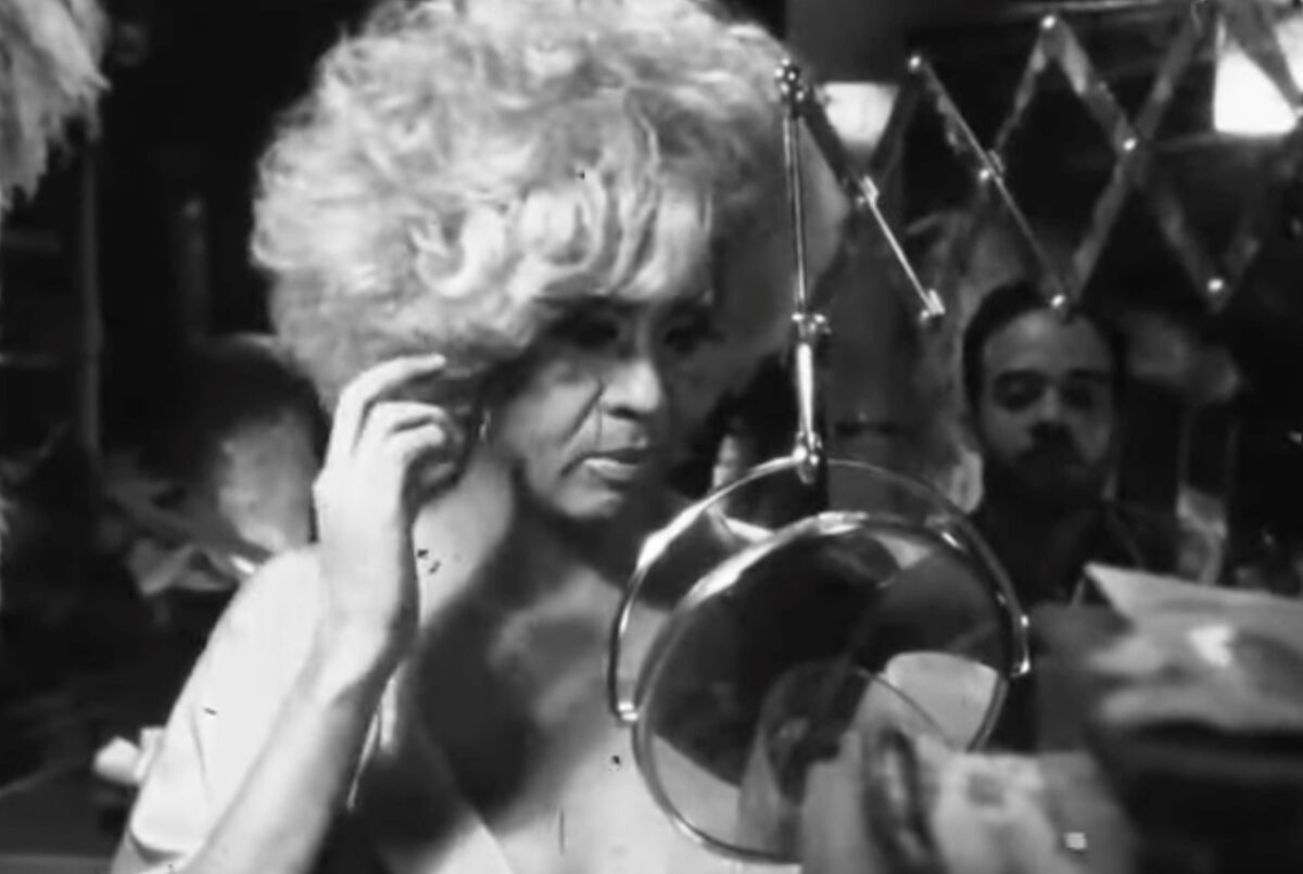 This trans drag ball superstar revolutionized queer fashion. She also hid a body in her closet.