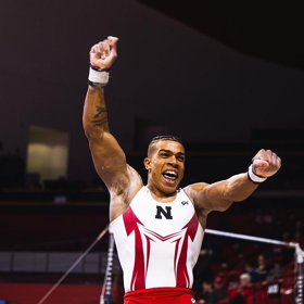 Star gymnast Sam Phillips celebrates the end of his 5 years at Nebraska in style