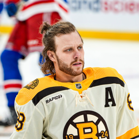 NHL star David Pastrnak rocks a man bun on the ice & fans don’t quite know how to handle it