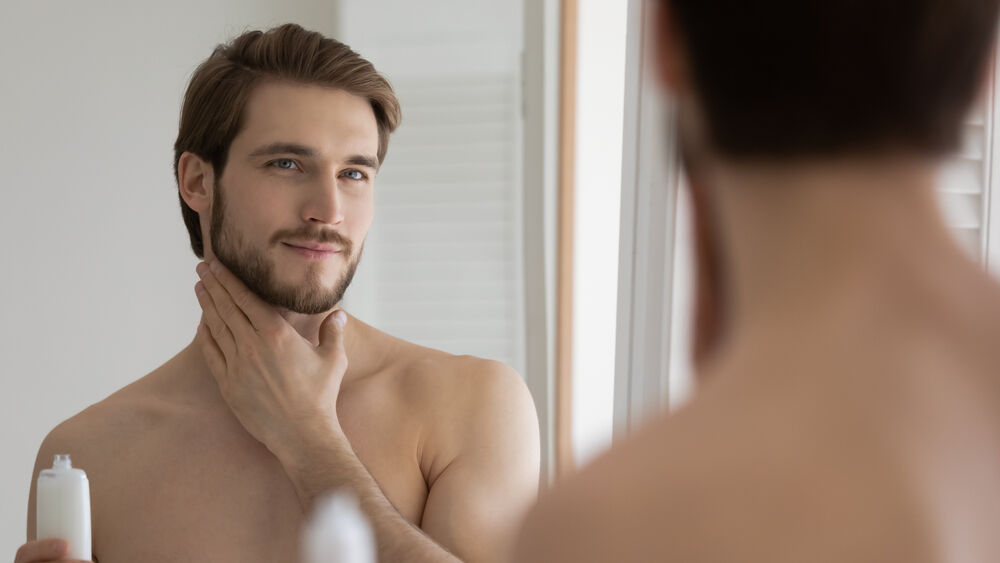 Man looking in mirror