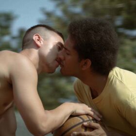 WATCH: Sparks fly on the court for a deaf athlete & his handsome opponent in this sweet short