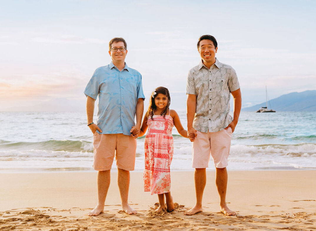 Raymond J. Lee (far right) on the beach in Hawaii with his family.