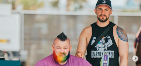 The “World’s Strongest Gay” retires as a winner & he’s making our hearts melt alongside his adorable husband