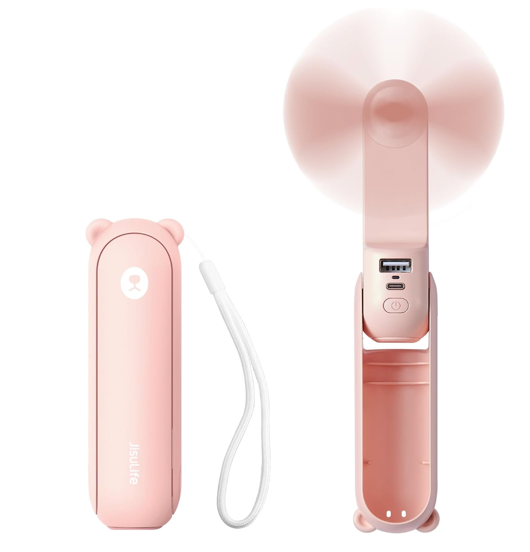 The JISULIFE 3-in-1 handheld mini fan in light pink. On the left, it's pictured folded up, on the right, it's pictured folded out and spinning.