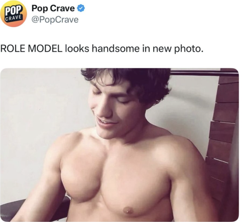 A screenshot of a Pop Crave tweet featuring a picture of Brandon from Sean Cody and the caption, "ROLE MODEL looks handsome in new photo."